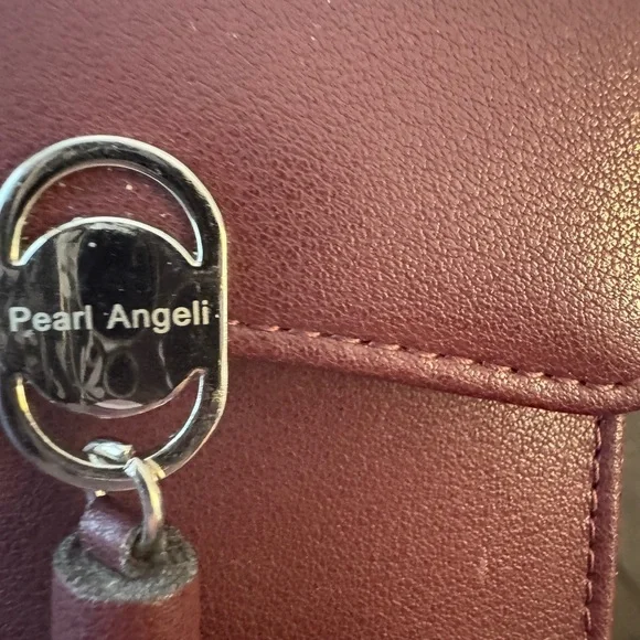 Burgundy Faux Leather Tassel Wristlet/Crossbody purse. - Picture 2 of 10